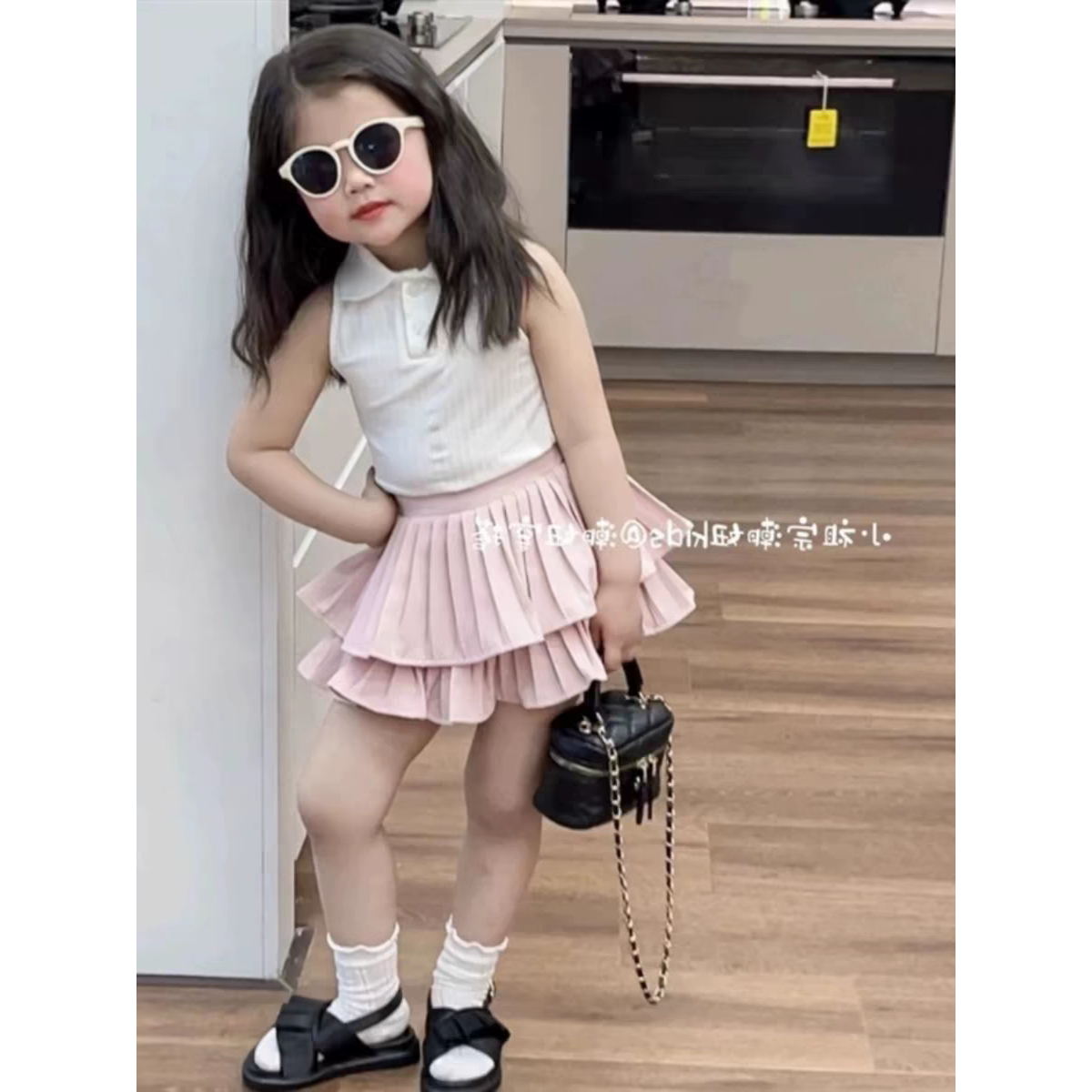 1316新款女孩polo针织夏装无袖背心+百褶蛋糕短裙套装