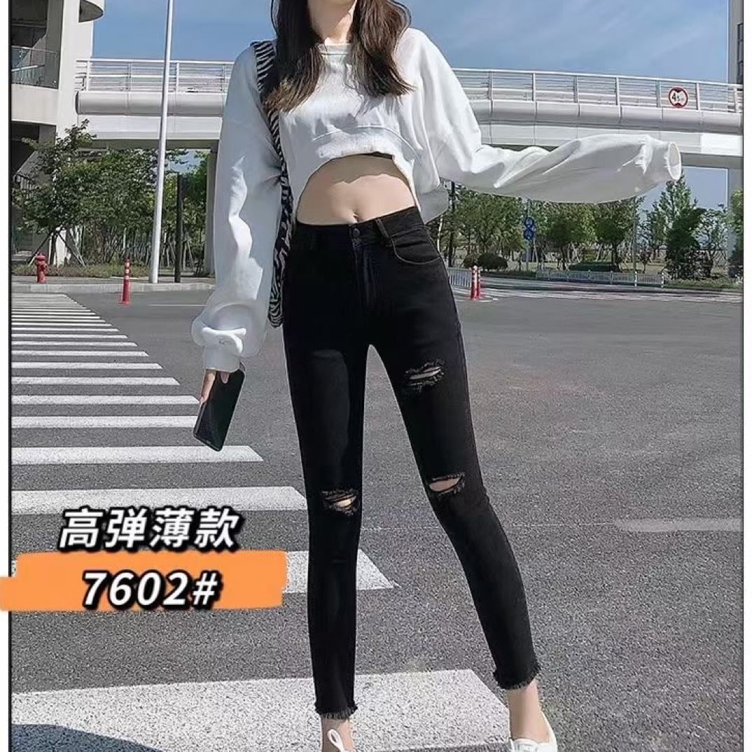 时尚夏款个性2023潮流百搭黑色破洞小脚牛仔长裤