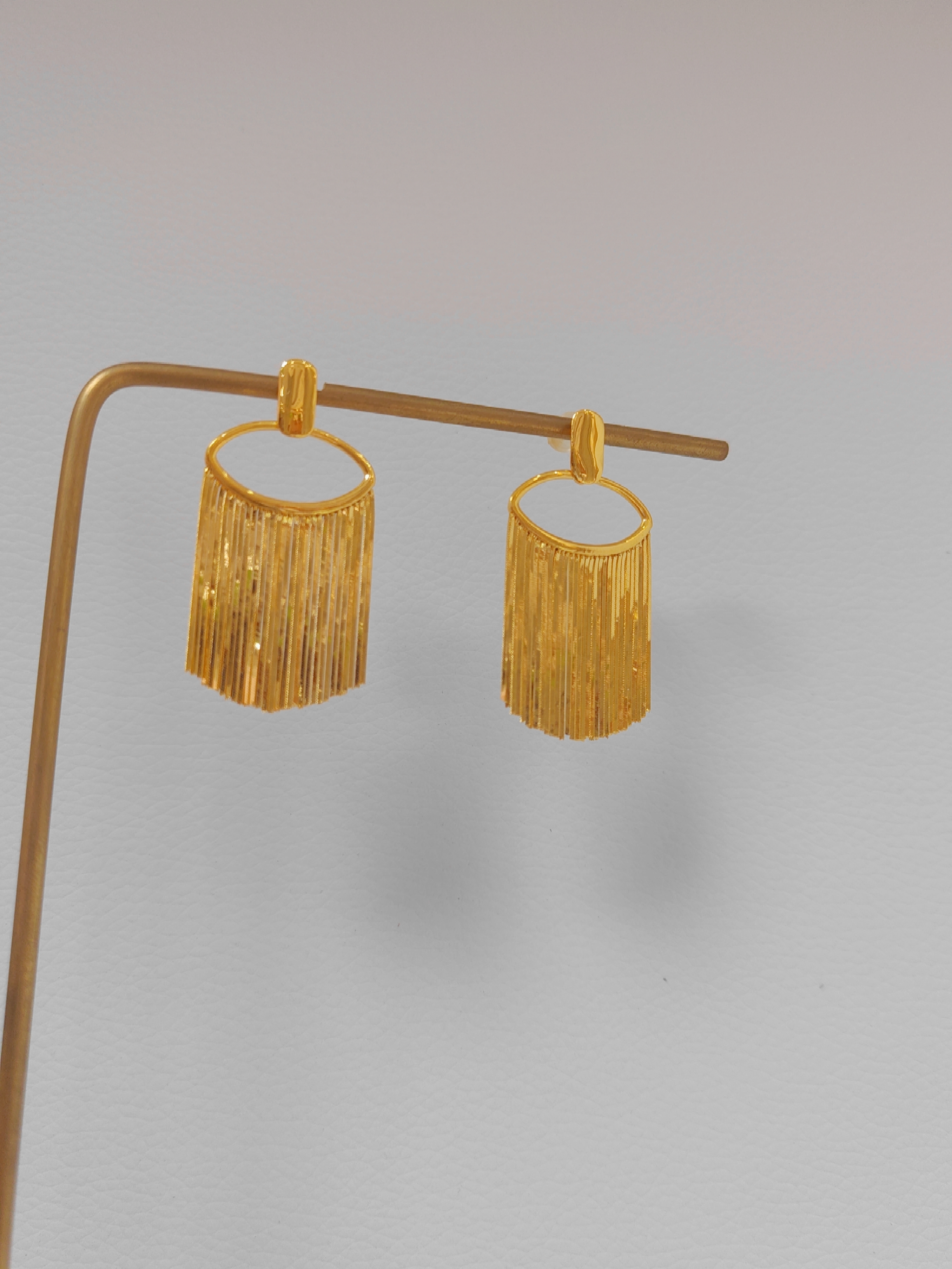 足金999亮面眼睛蛇骨流苏耳饰