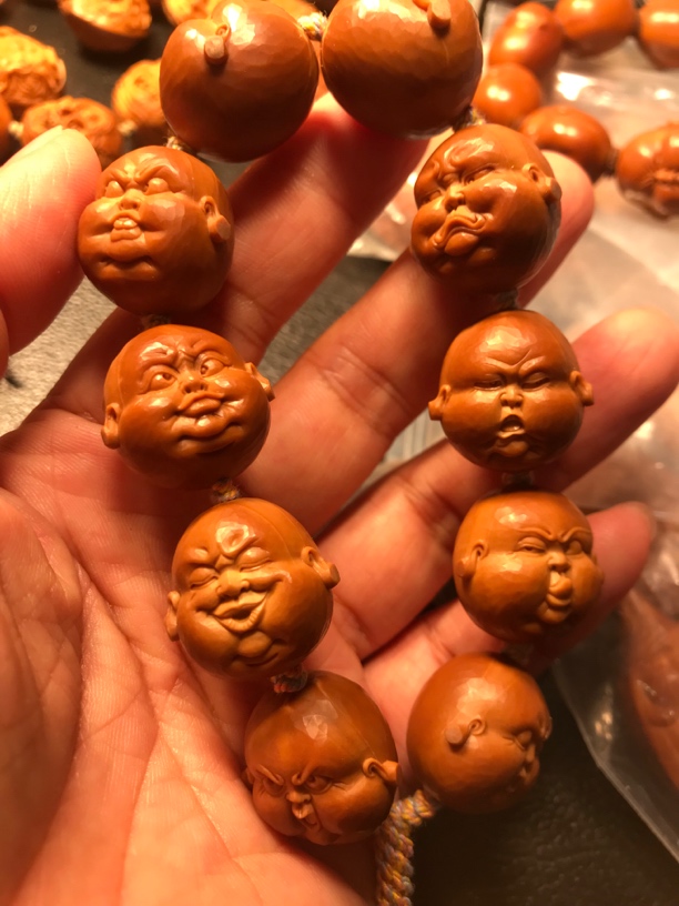橄榄核雕刻百态手串