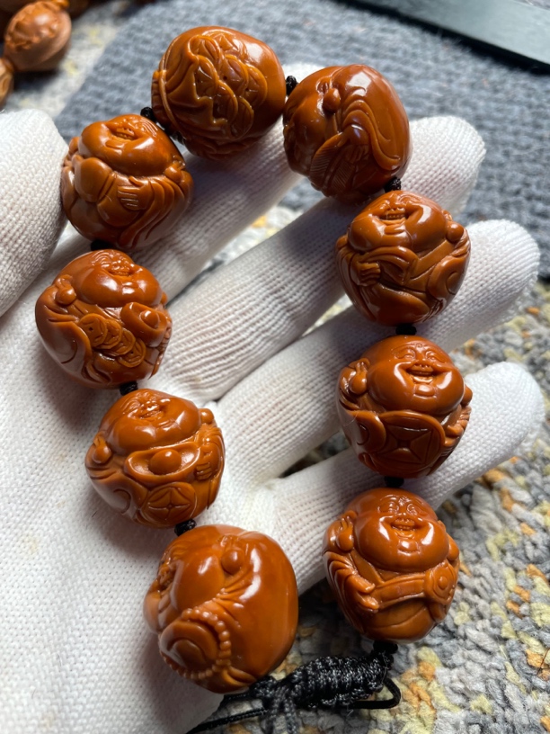 橄榄核雕刻手串弥勒