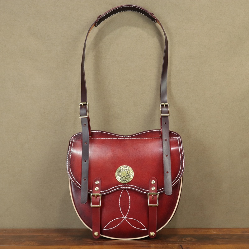 头层牛皮托斯卡纳女士时尚休闲手提手挽马鞍包包