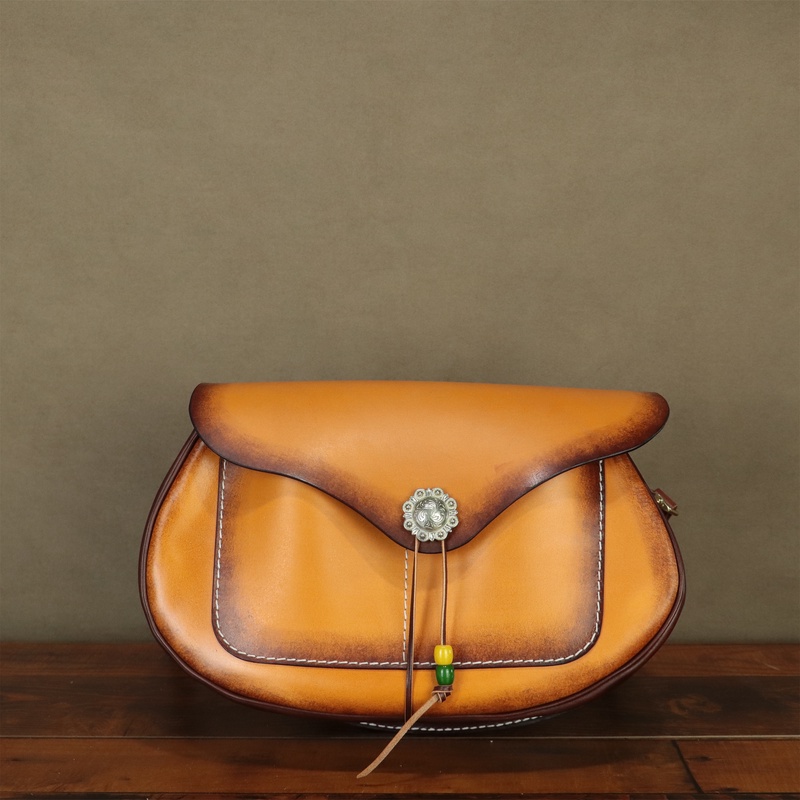 头层牛皮托斯卡纳女士时尚休闲单肩斜挎马鞍包包