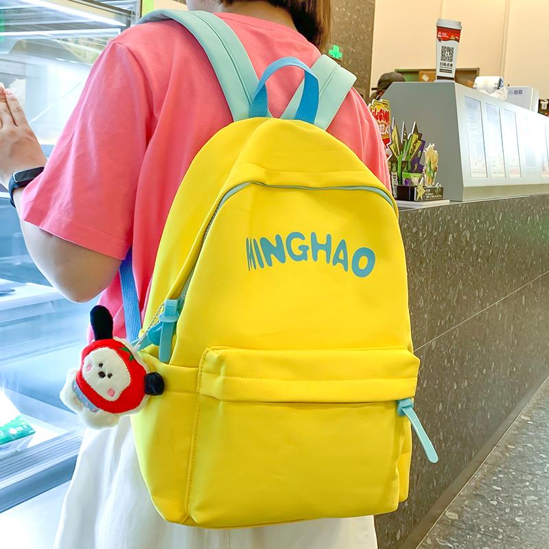 双肩背包女大学生 上课轻便休闲旅行包 字母简约高中生荧光色书包