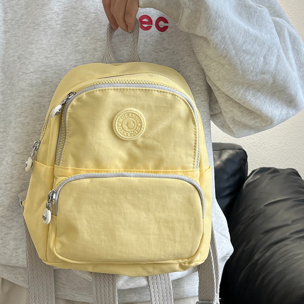 日系可爱糖果色双肩包休闲百搭包帆布包妈咪包轻便旅行小学生书包