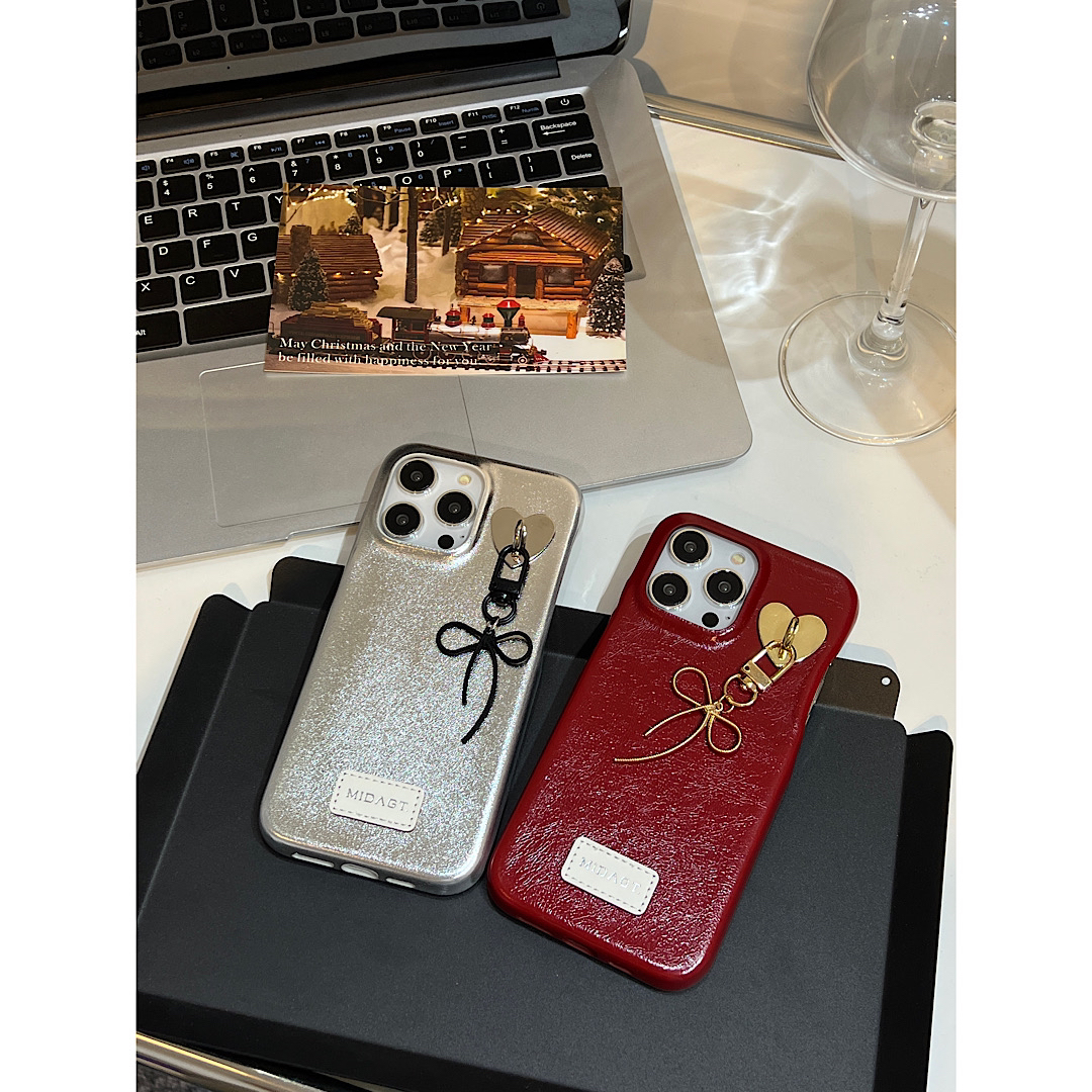 小众设计iPhone15蝴蝶结挂坠苹果14pro手机壳皮质适用苹果系列