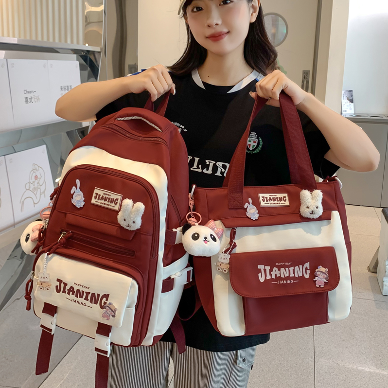 书包女小学生3一6年级韩版初中女生高中生大学生减负儿童背包挂件