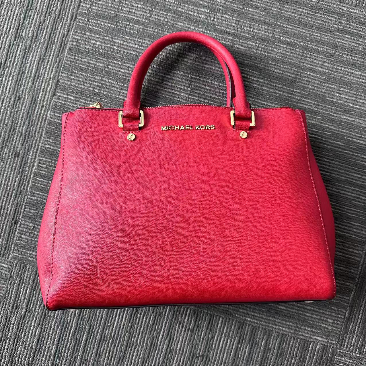 99新 MICHAELKORS/迈克高仕 红色 手提 腕挎 皮皮 斜挎包包