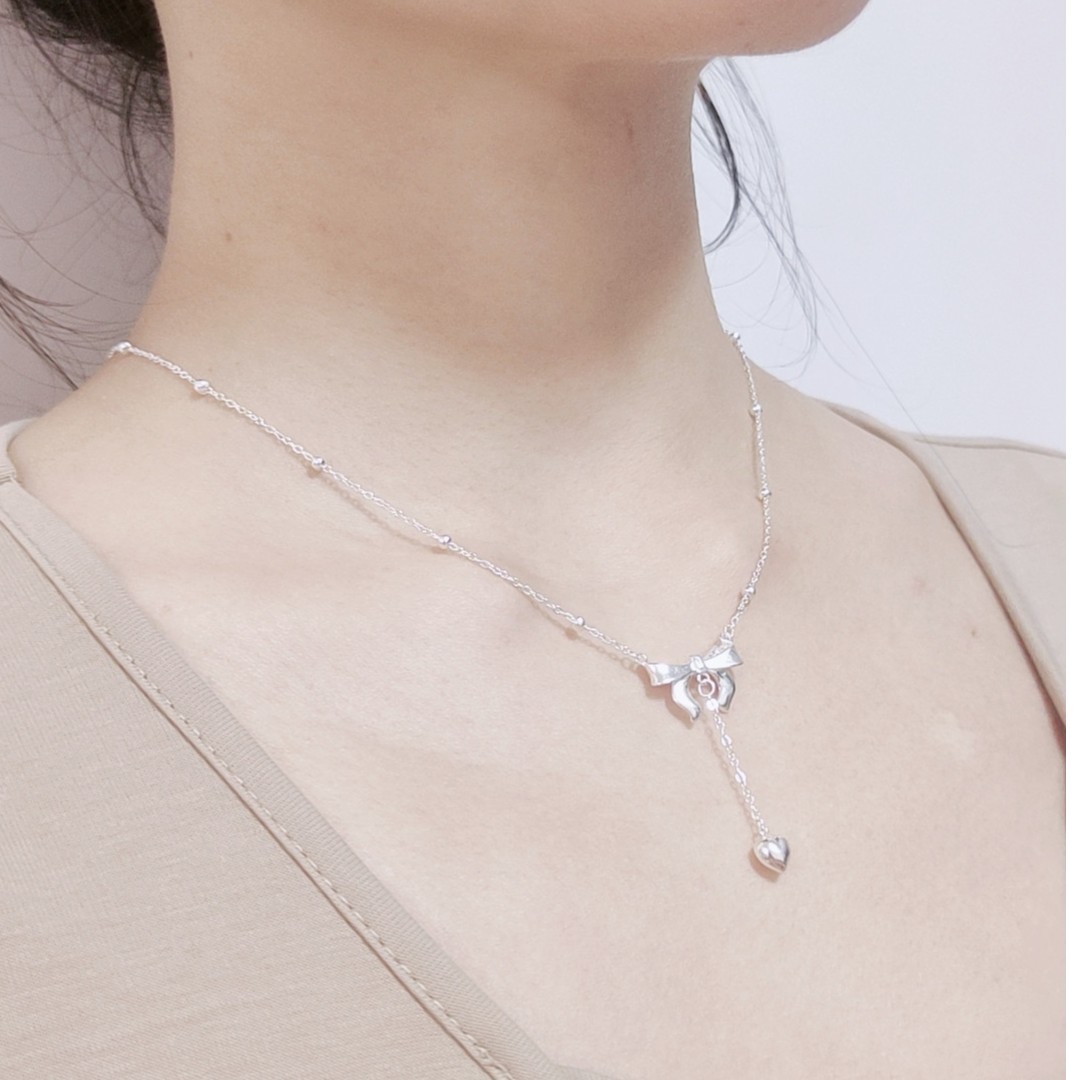 坠链均足银 坠链足银 足银990在逃公主蝴蝶结套链 轻奢小众锁骨链
