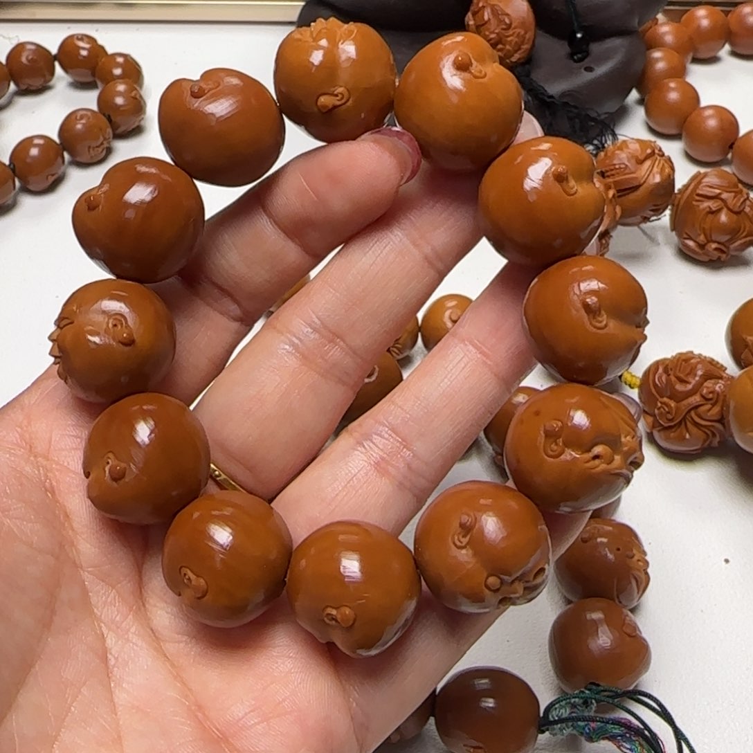 橄榄核核雕山****风橄榄核雕刻