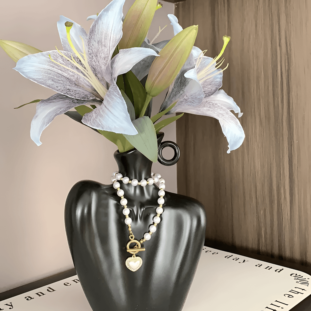 INS鸵鸟毛除尘掸北欧轻奢陶瓷人像花瓶餐厅创意小众玄关套装