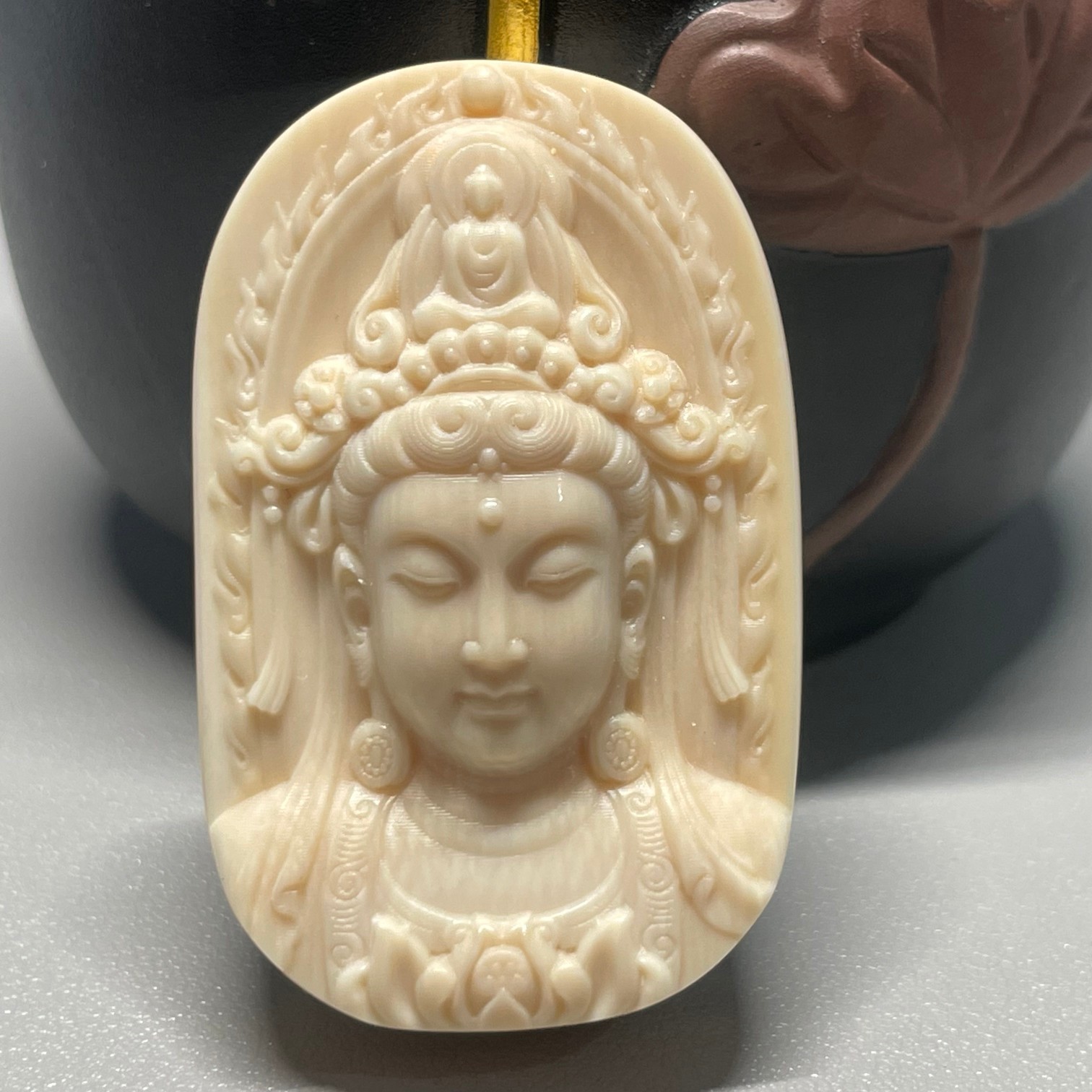 猛犸牙天然原皮观音菩萨吊坠牌子