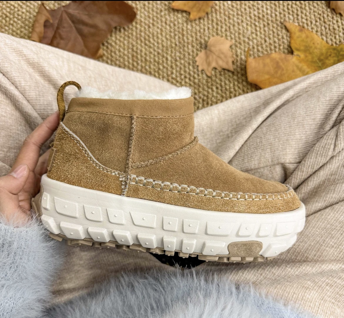 冬季女士轮胎底羊皮毛一体雪地靴时尚增高防滑保暖