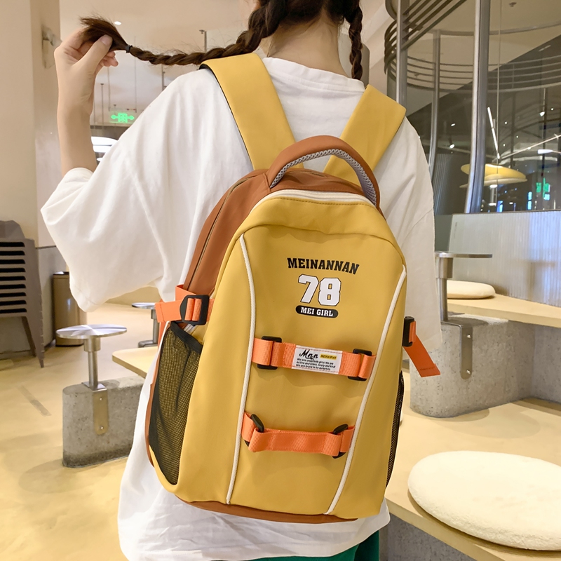 美式复古撞色双肩包小众设计小学生初中轻便简约书包女休闲韩版