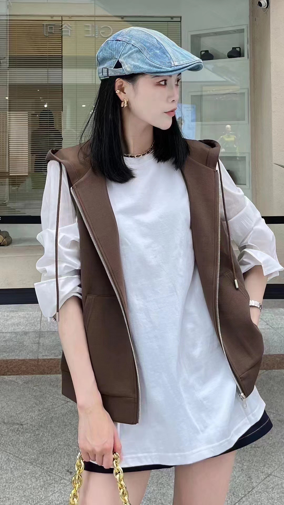 易缔媤带帽马甲DE40065