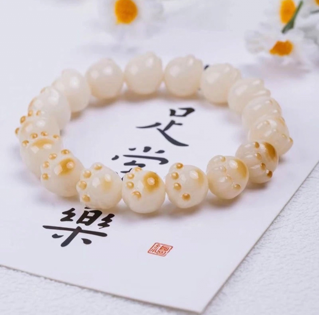 白玉菩提根炭烧猫爪单圈绕指柔手串