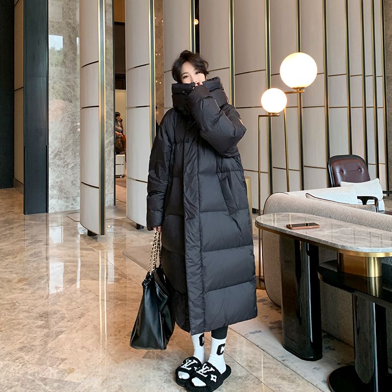 黑色长款羽绒服女年新款冬季通勤设计感过膝保暖大被子加厚
