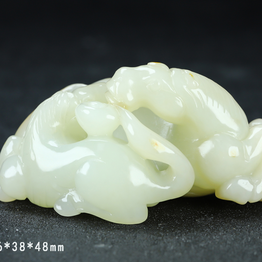 F25海川拍卖和田玉手把件