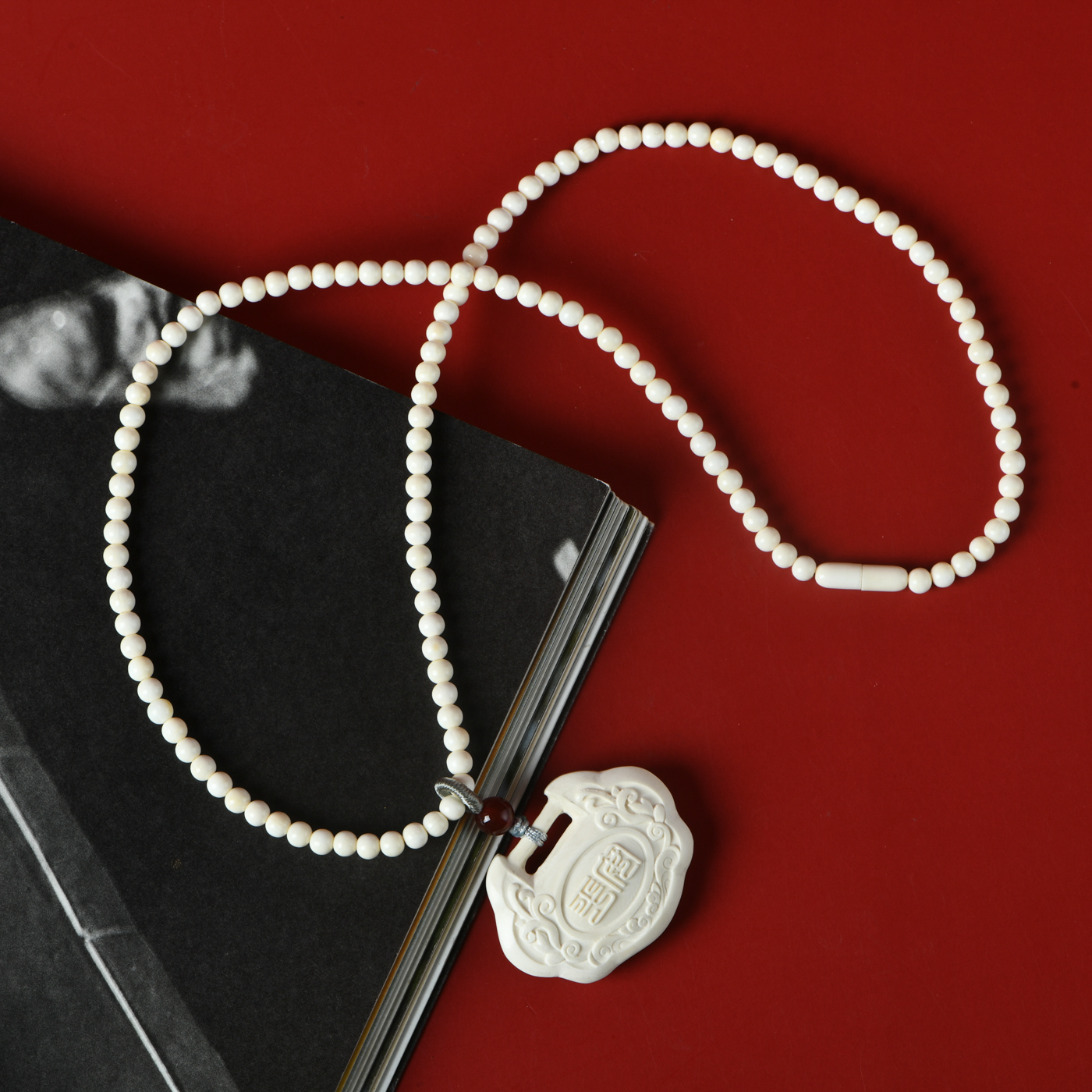 猛犸牙0.4带如意锁脖挂