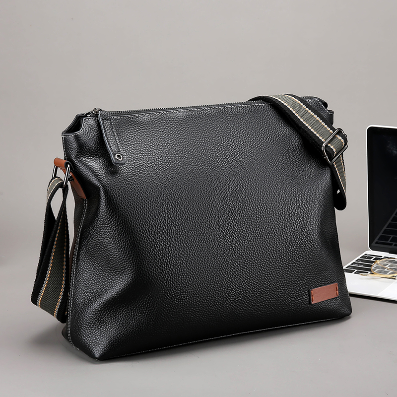 头层牛皮2024新品斜跨大邮差包公文包时装包短途旅行包
