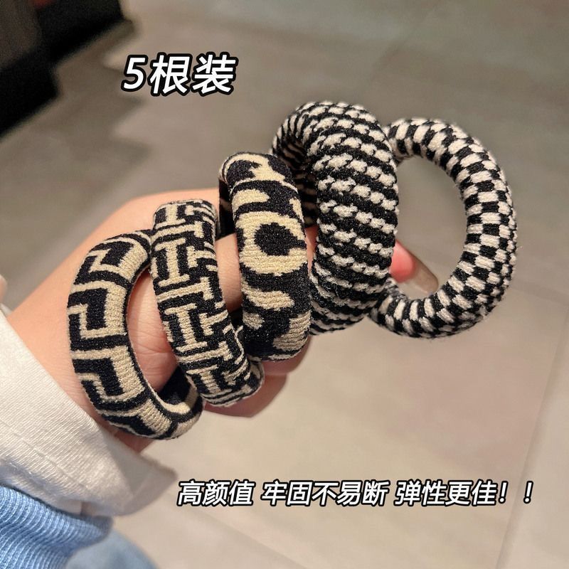 高颜值皮筋女扎头2023新款发圈棋盘格头绳高级感简约气质秋橘里