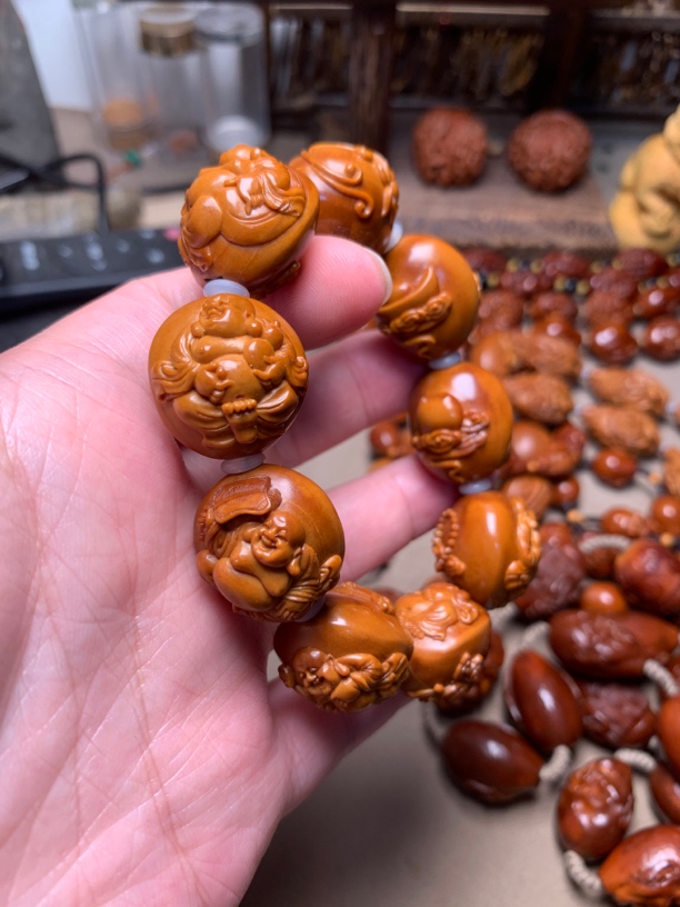 橄榄核雕昭军2.2铁核八宝弥勒回血