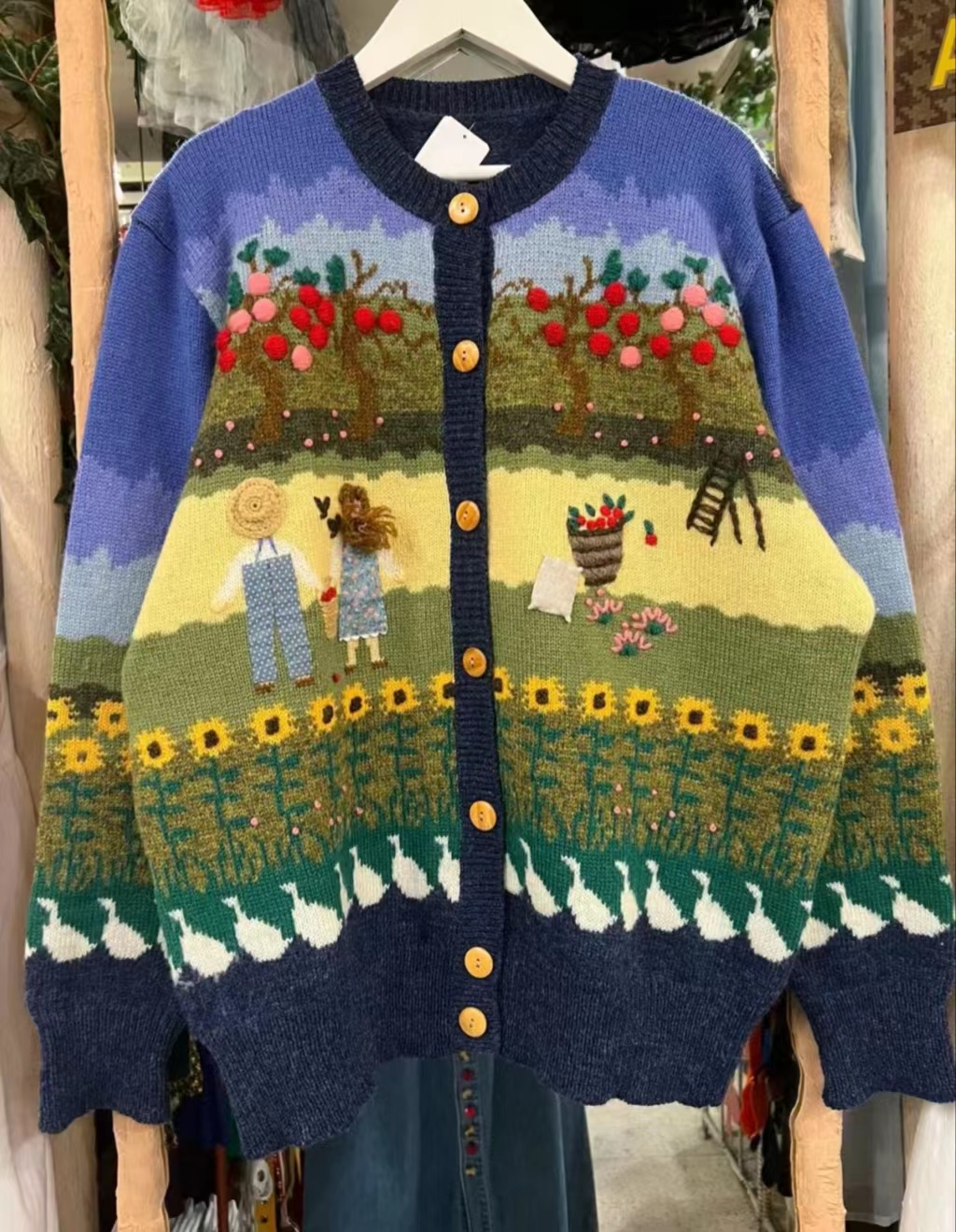 沐云精品大码气质卡通毛衣