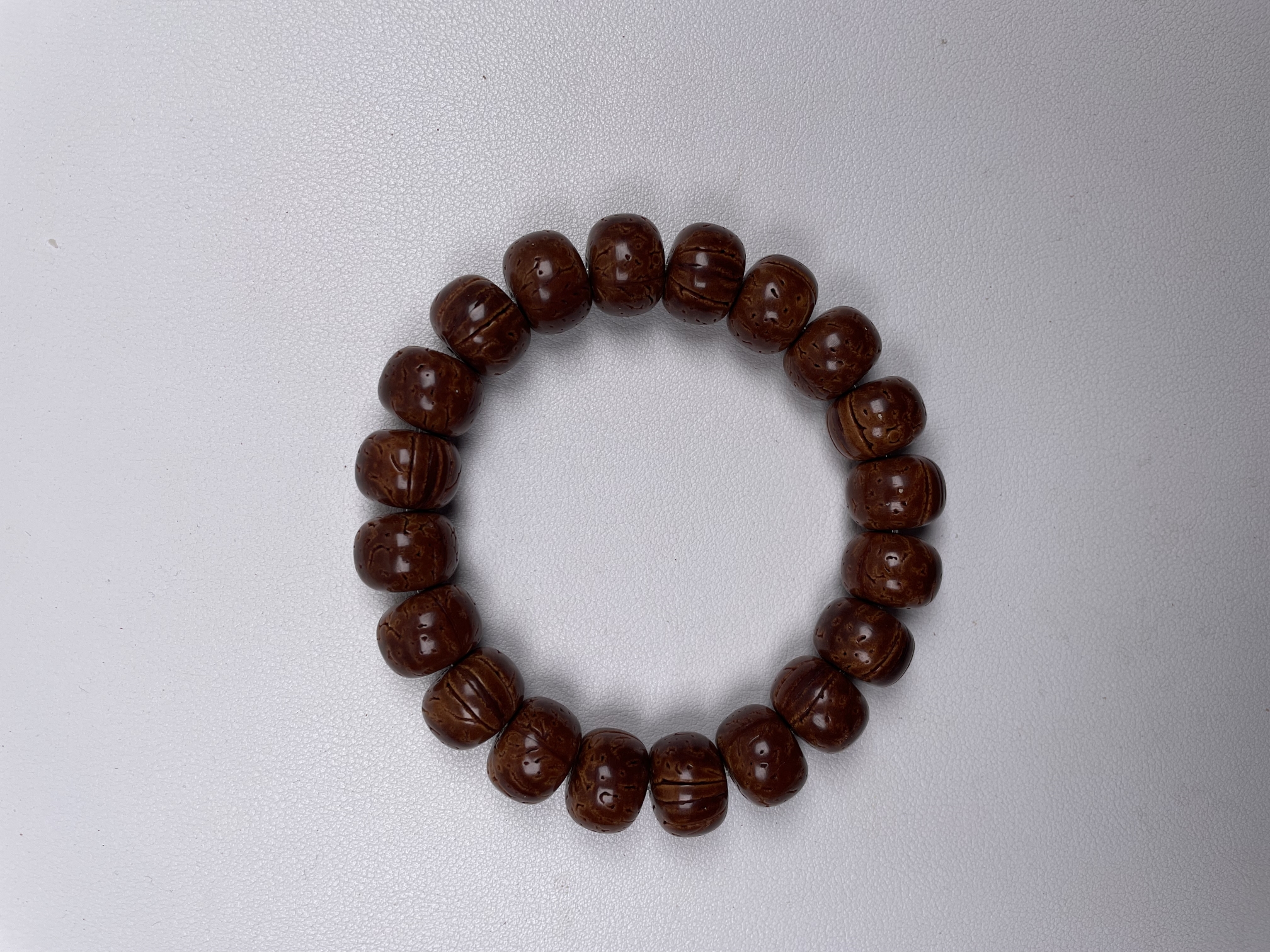 桃核光珠手串（红皮油核）