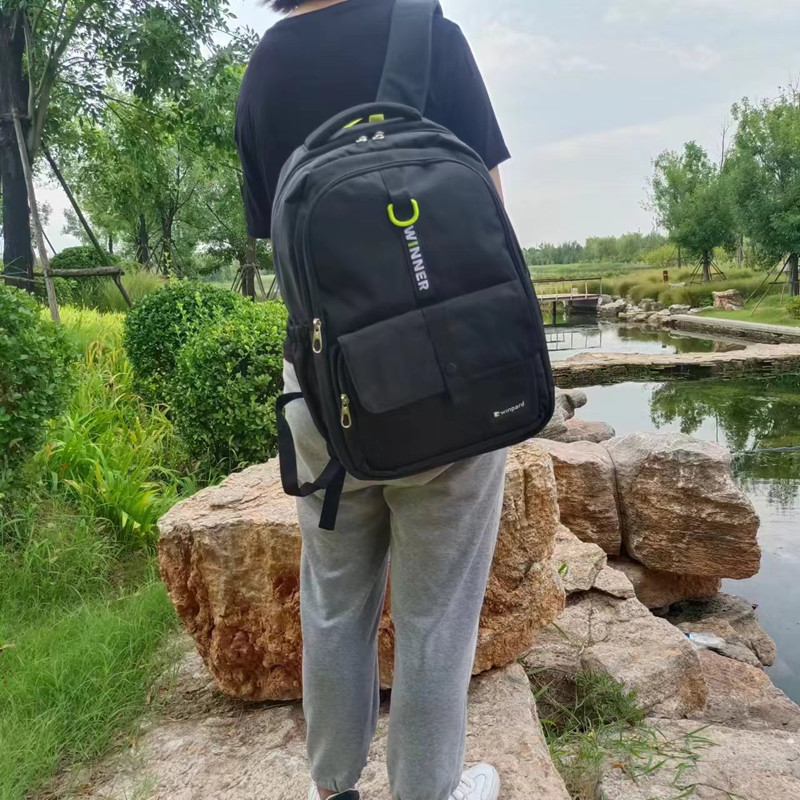 威豹双肩背包手提肩挎包学生包旅行包简约时尚品质耐用防雨新款