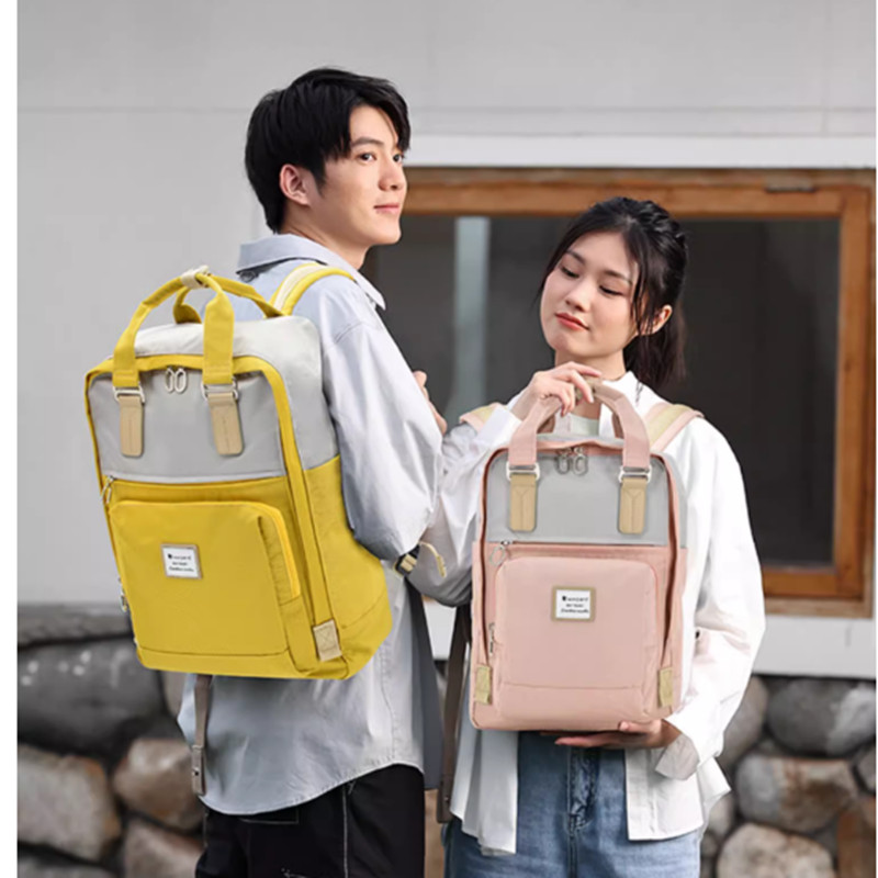 威豹双肩背包手提多功能学生包宝妈包旅行包简约时尚休闲防水韩版