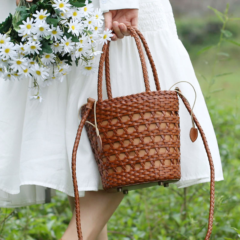 小众高颜值手工牛皮编织包包镂空小菜篮复古时尚手提斜挎包水桶包