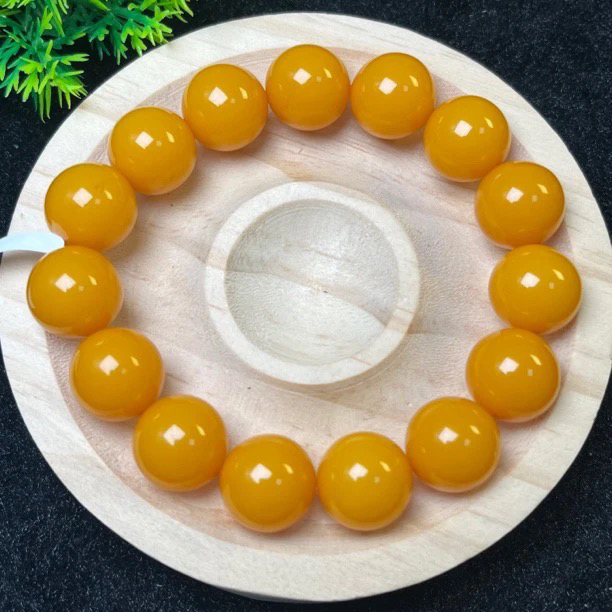 W032古巴新蜜帝王黄手串14mm+