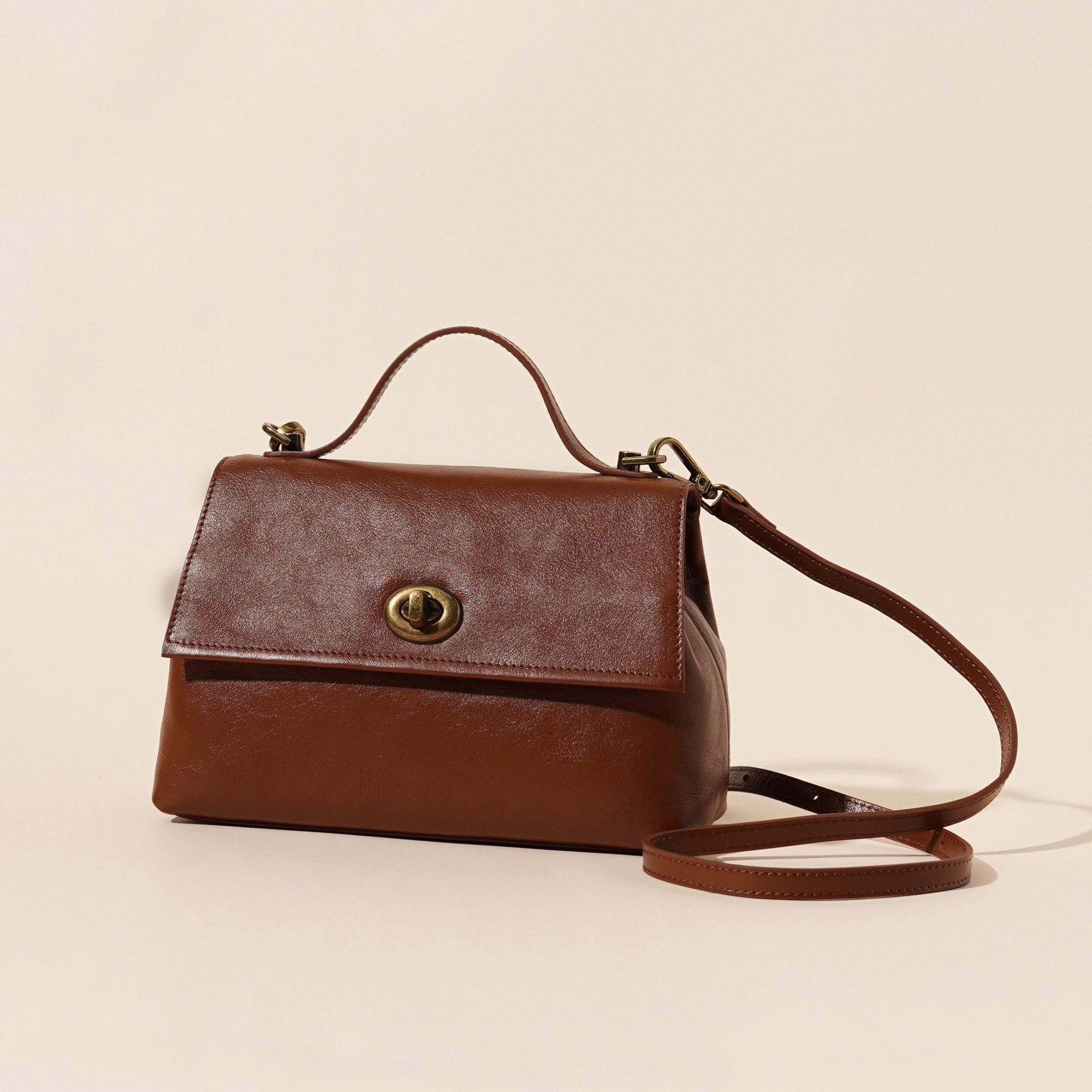 岩牛新款时尚手拎斜挎百搭简约女士包包YN3455