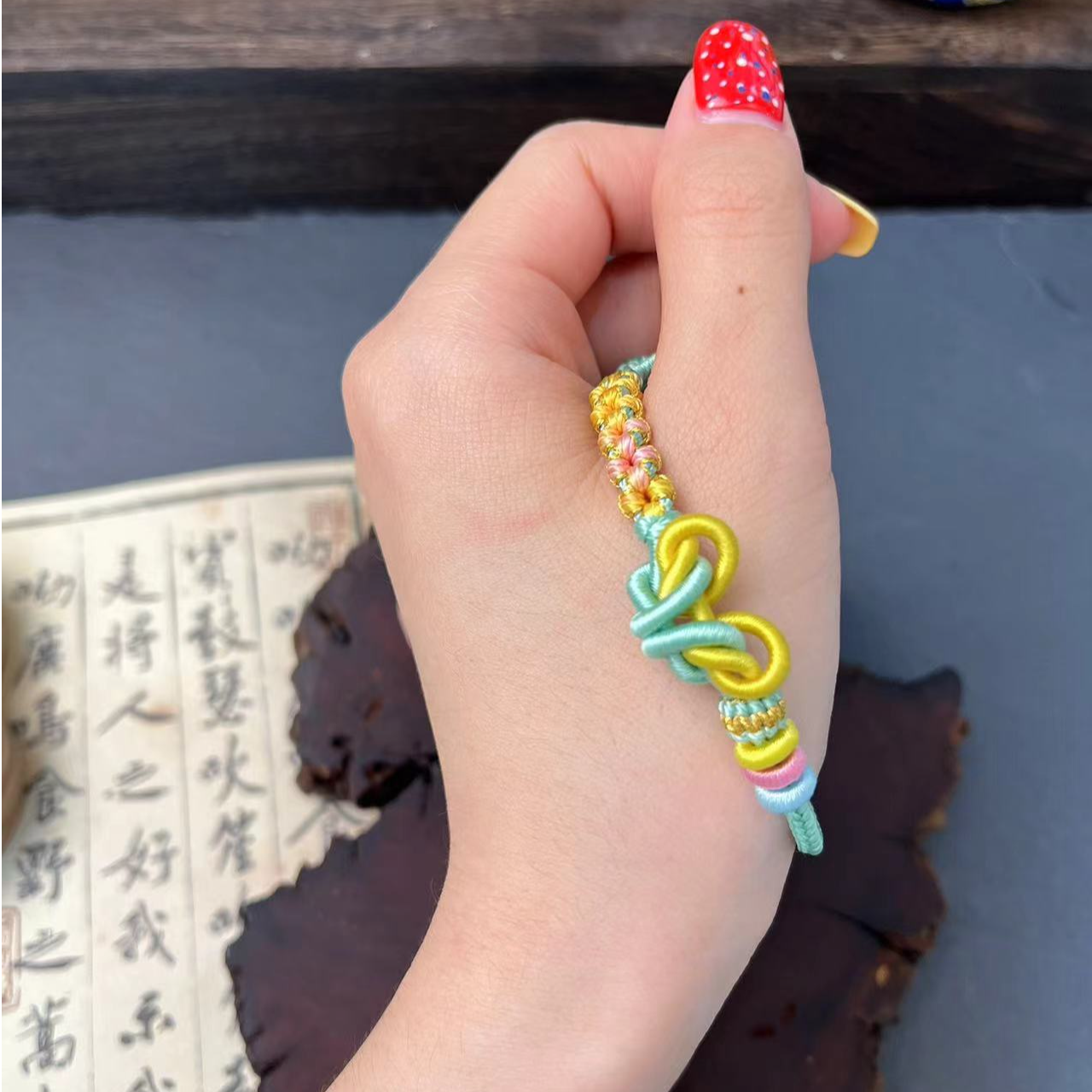 非金属布艺手链 2026马年手工编织桃花结男女款手链