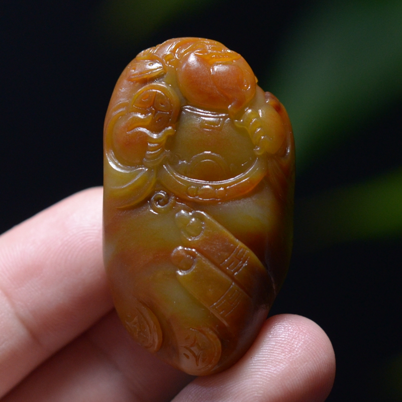 35.3g 新疆和田艳丽聚色枣红油皮白玉独籽财神