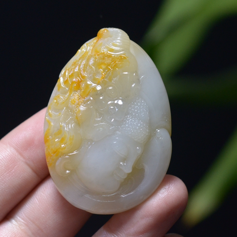 52.2g 新疆和田橘红皮四色老熟糖白玉籽料悟道牌子