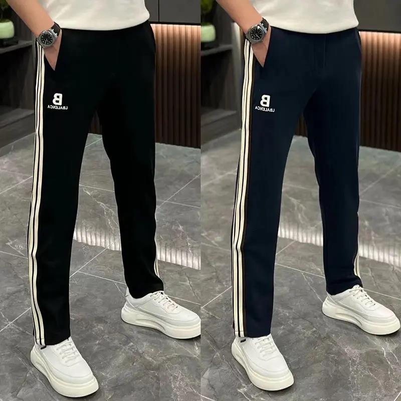 休闲裤男士冬季新品潮牌织带拼接运动裤时尚欧货阔腿宽松直筒卫裤