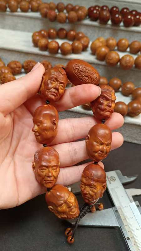 橄榄核雕七星罗汉