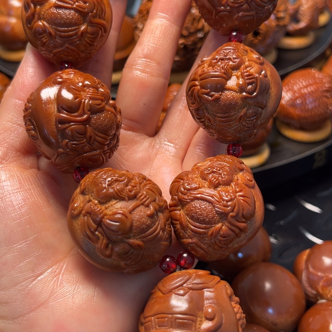 橄榄核核雕龙财一条