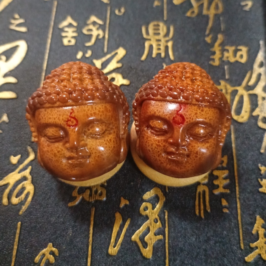 巴西橄榄核雕刻佛头手球一对