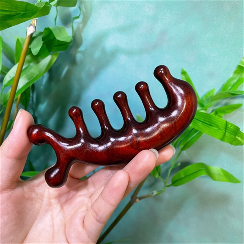 紫檀木原木原色小海豚按摩梳 尺寸：11*5*2cm