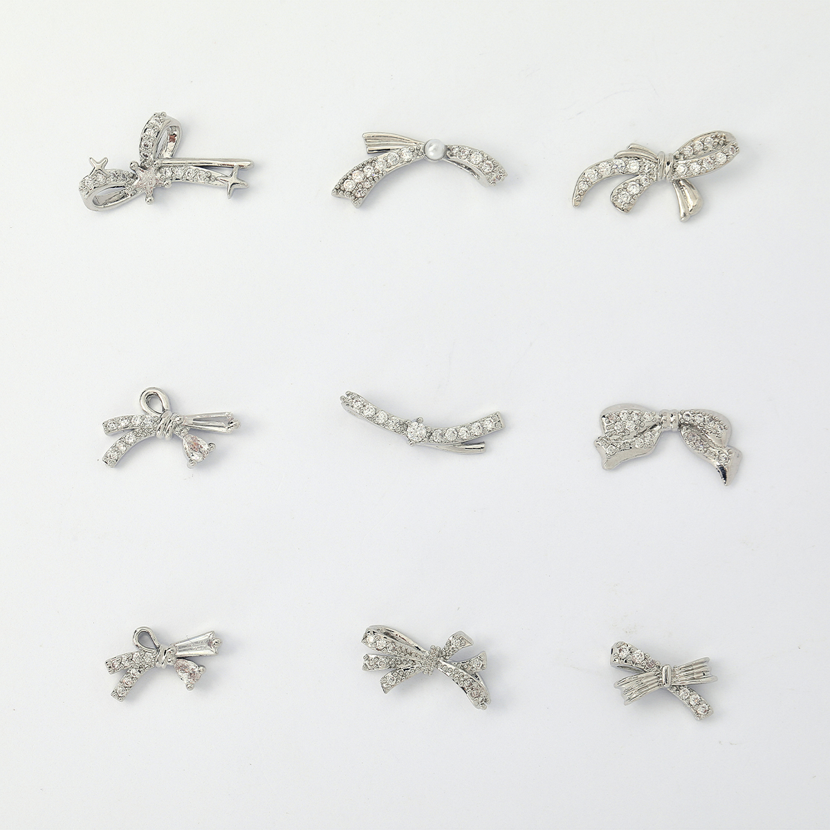 流行甲侧边蝴蝶结美甲饰品铜镶锆石装饰立体指甲配件电镀镶钻