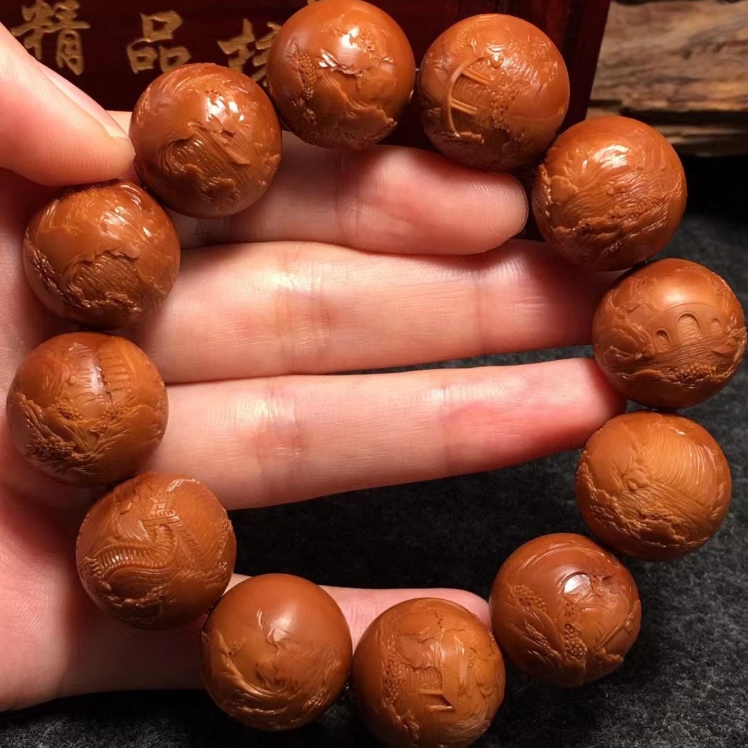 橄榄核雕作品刘小琴满工锦绣山河正圆光珠雕刻手串纯手工老油核