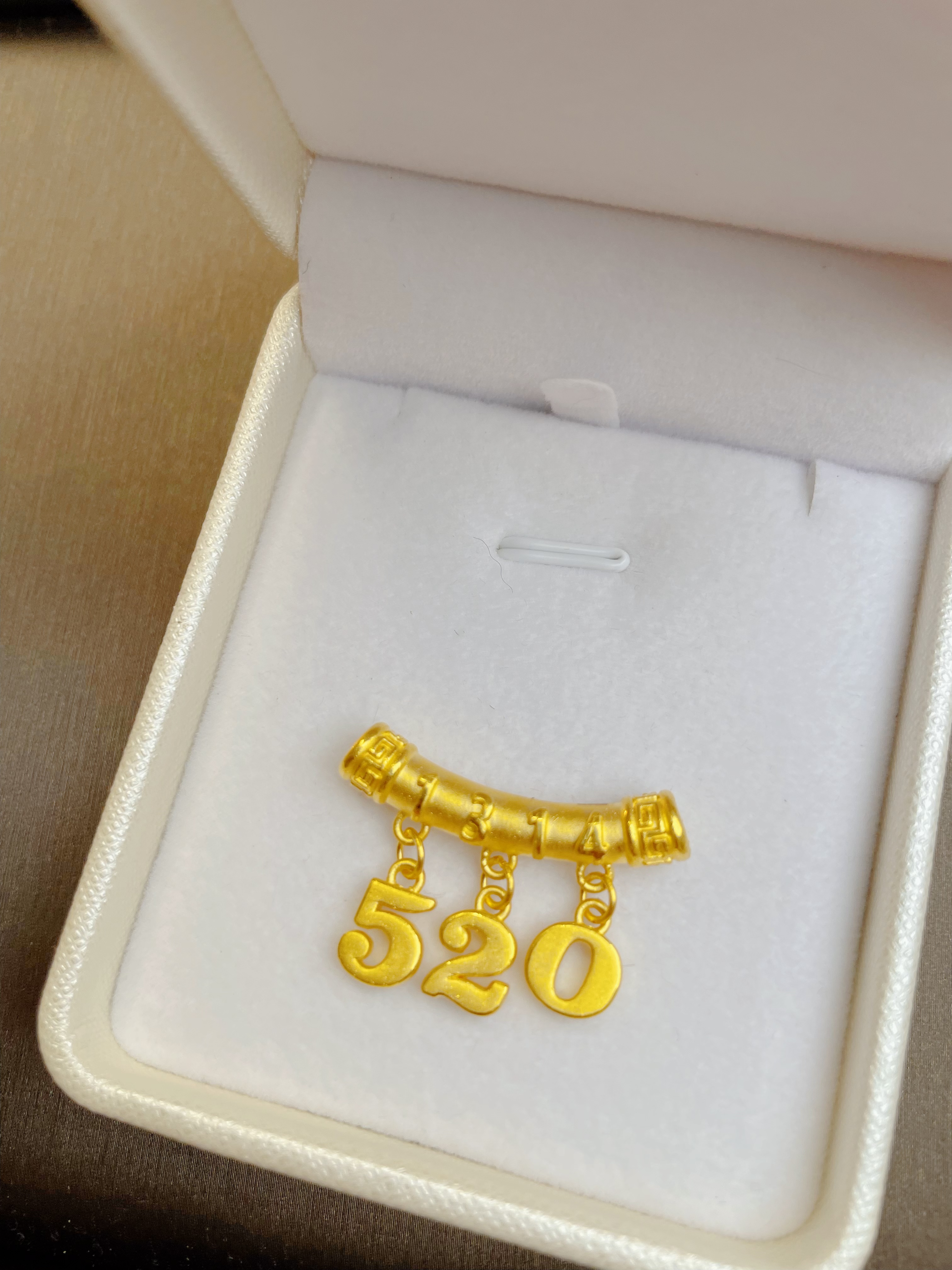 足金999弯管520吊坠