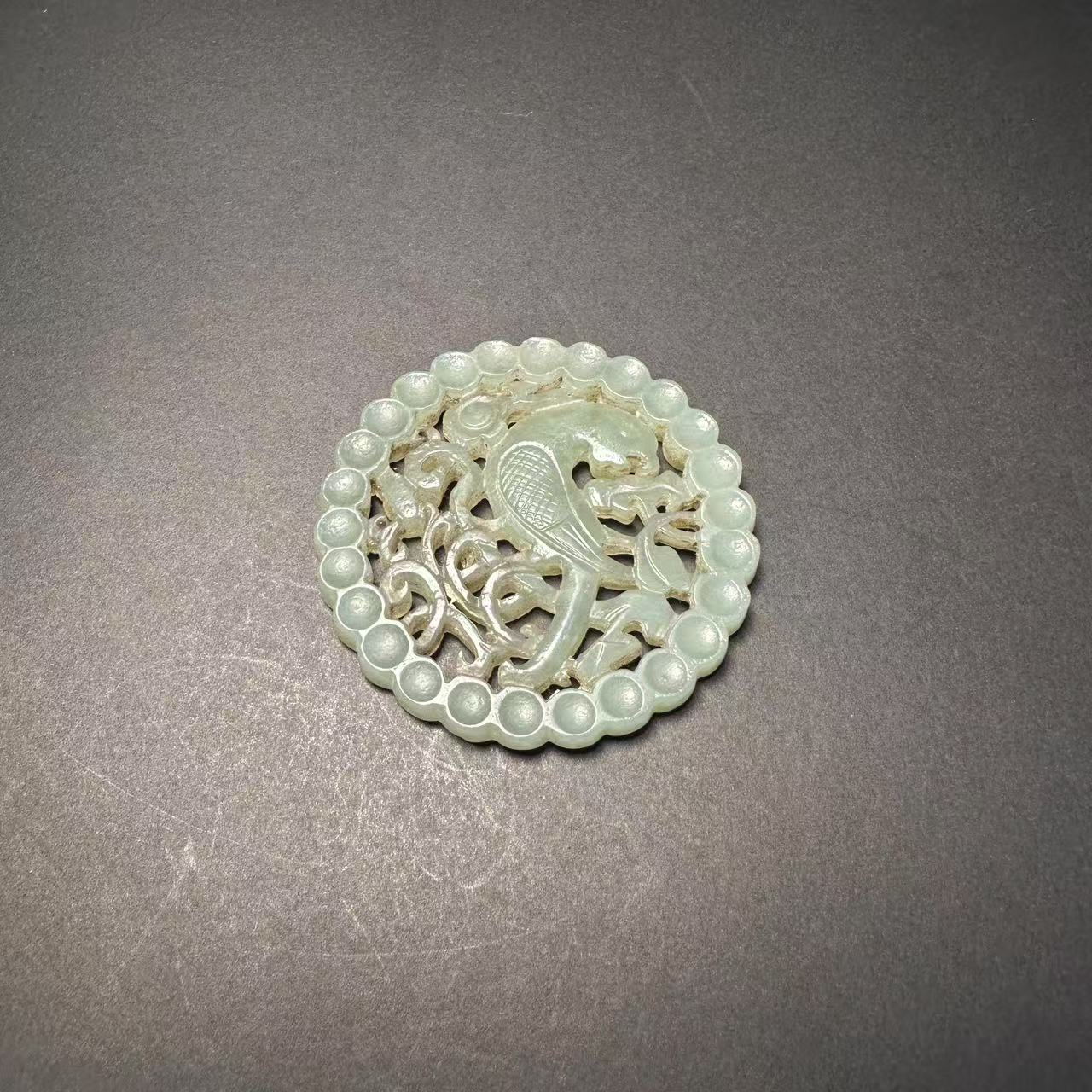 创汇时期 和田玉连珠纹鹦鹉佩(英明神 武)666-82