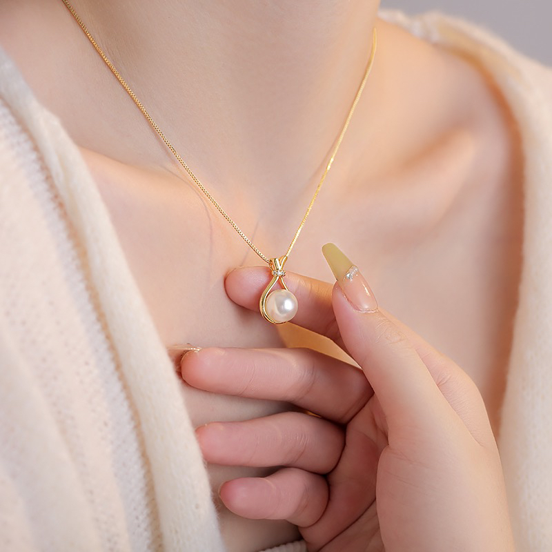 JIN BAI ZHENG 钛钢项链 2025火爆款仿贝珠小福袋项链时尚不掉色