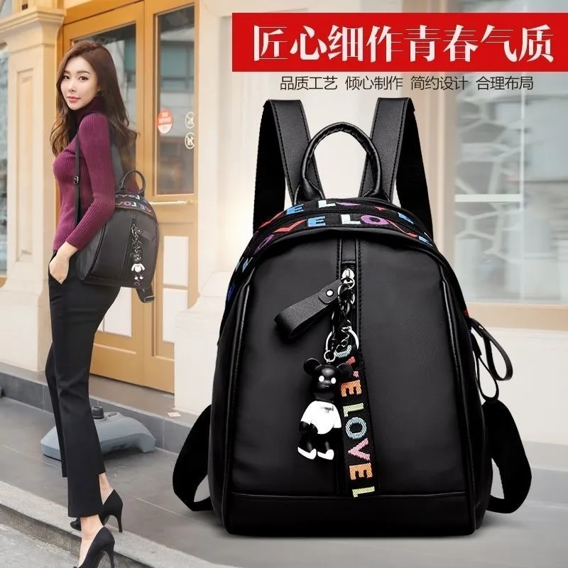 双肩包女士包2022新款简约潮百搭牛津布书包背包女生小背包字母包