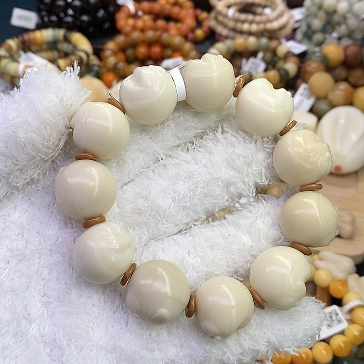 菩提根/象牙果手串11.13.59象牙果原果雕刻机器猫