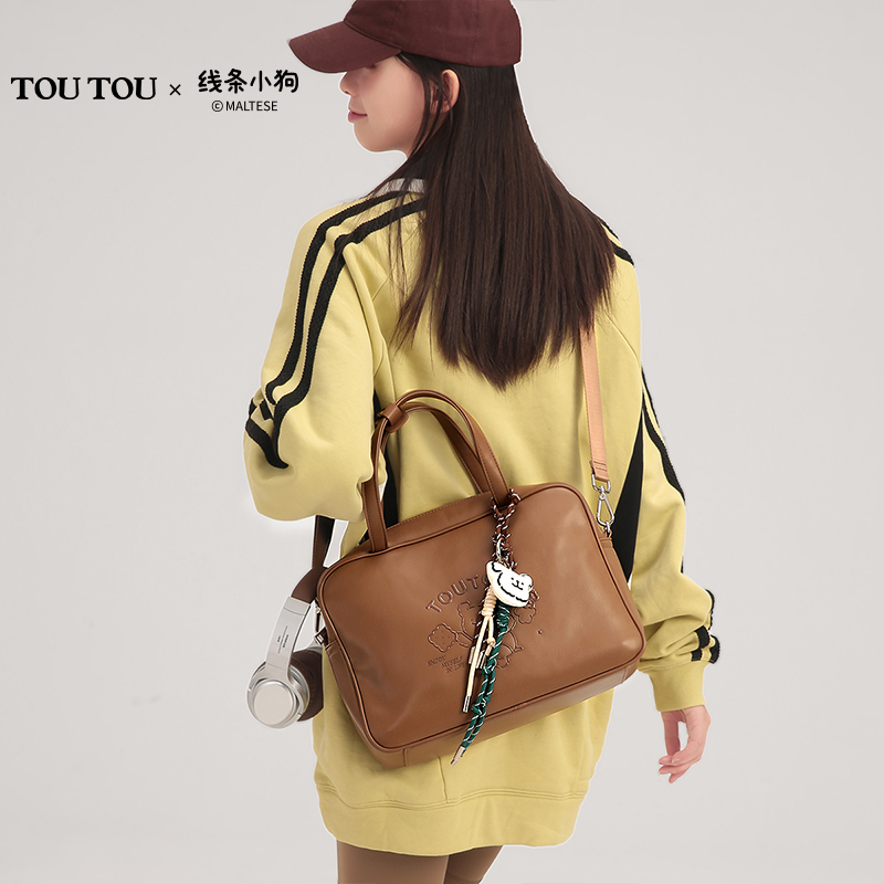 TOUTOU新款线条小狗波士顿保龄球包新款大容量通勤包手提斜挎包女