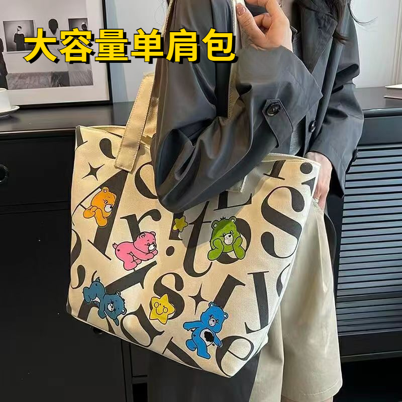 学生帆布包女大容量托特通勤包印花休闲妈咪包手提单肩包购物袋女